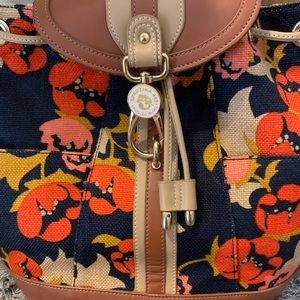 Navy/floral leather Spartina 449 daufuskie island back pack in great condition.